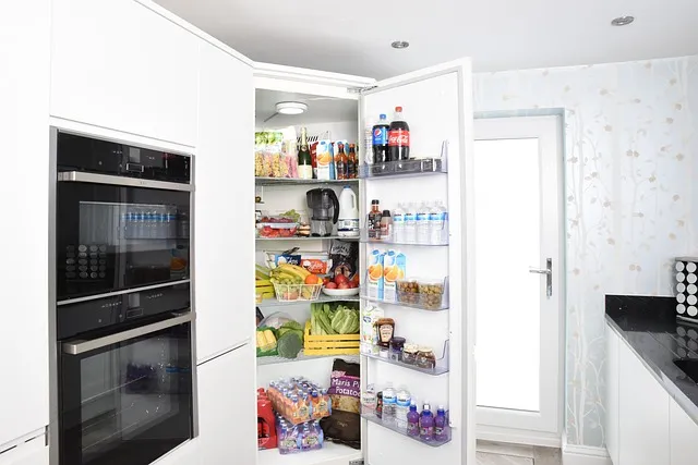 A collection of beverages including milk, orange juice, and wine, properly stored to maintain freshness.
