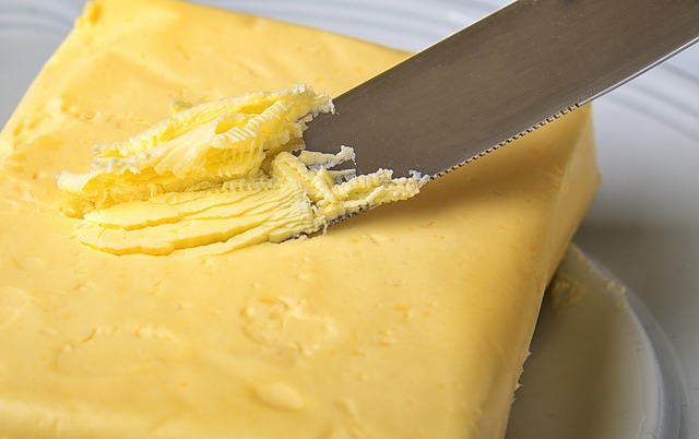 Stick margarine and a tub next to a fridge — comparing storage options